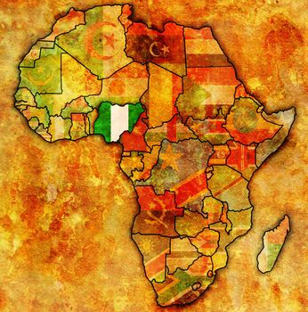 nigeria on actual vintage political map of africa with flags