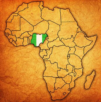 nigeria on actual vintage political map of africa with flags