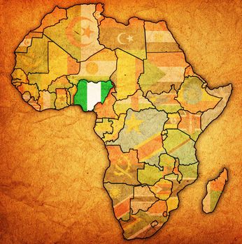 nigeria on actual vintage political map of africa with flags