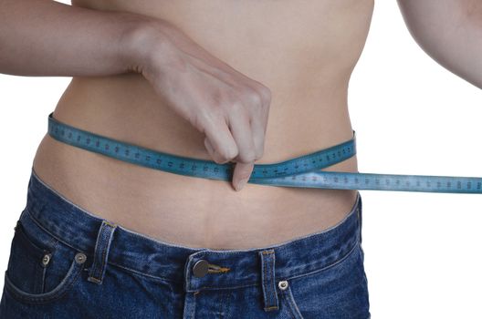 woman measuring her waist to see how much weight she lost