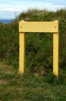 A Blank Sign At A Beach For Your Text