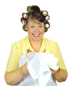 Frumpy housewife wiping up the dishes with a smile.