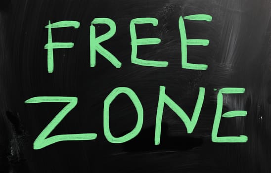 "Free zone" handwritten with white chalk on a blackboard