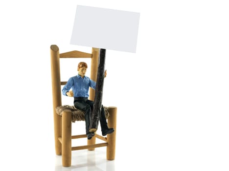 puppet toy man sitting on chair with information board