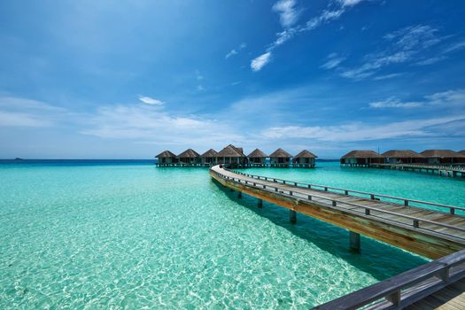 Beautiful beach with water bungalows at Maldives