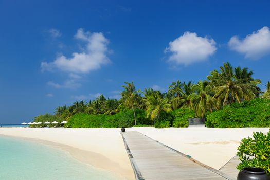 Beautiful beach with jetty at Maldives