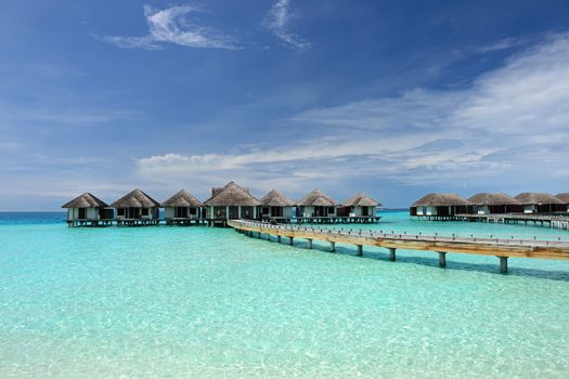 Beautiful beach with water bungalows at Maldives