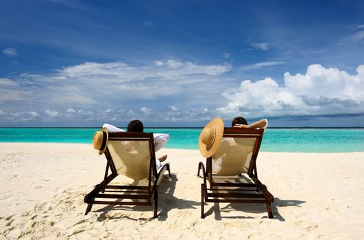 Couple on a tropical beach at Maldives