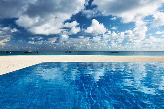 Luxury swimming pool in the tropical hotel