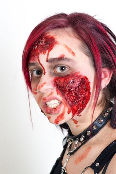 Red haired gothic girl with halloween makeup