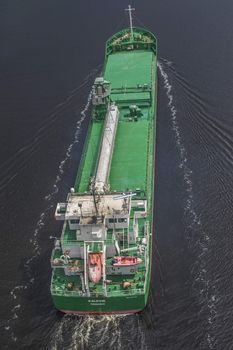 Cargo ship Kalkvik  going to the port of Halden, Norway in order to unload clay. The picture is shot from Svinesund Bridge.