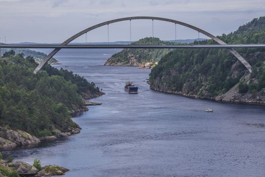 Cargo vessels Bal Bulk going to the port of Halden, Norway in order to unload gravel. The picture is shot from Svinesund Bridge