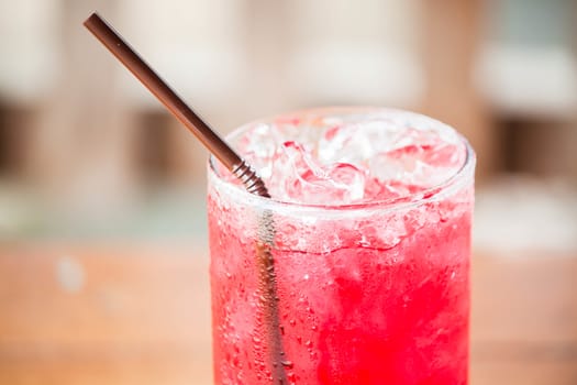 Close up ice cubes on red drink