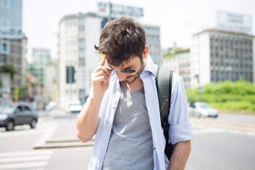 man in the street on the phone in the morning