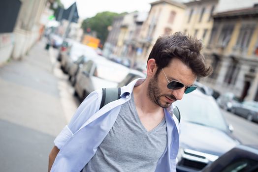 man walking in the street in the morning