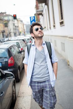 man walking in the street in the morning