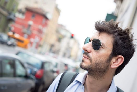 man walking in the street in the morning