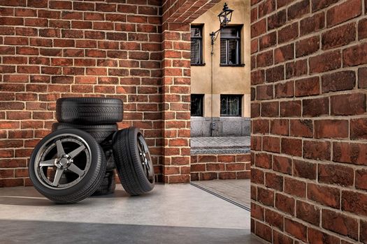 Several tires inside a garage