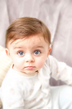 Cute baby staring at camera