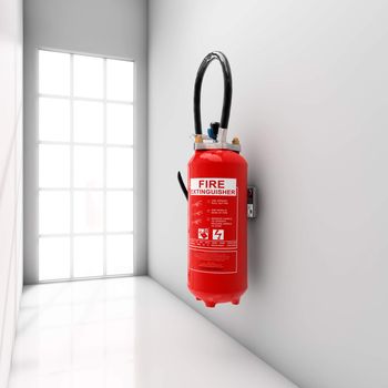 Extinguisher fixed on white corridor wall