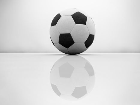 Football black and white on glossy surface