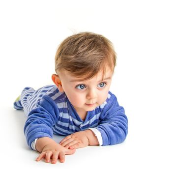 Lovely baby crawling on white background