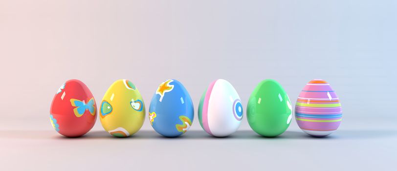 Set of Easter eggs decorated with different paintings aligned on white background