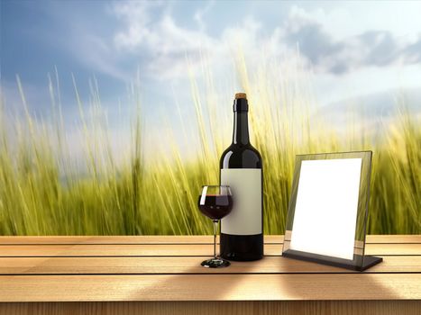 Bottle of wine and glass on sunny day