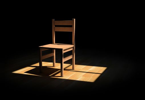 Chair on a dark room illuminated only by a light coming from a window