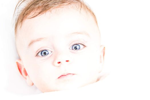 Highkey photo of a blue eyed baby