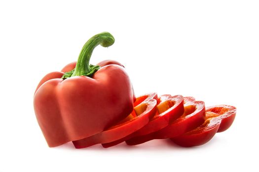 Red pepper sliced on white background