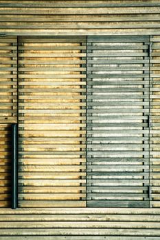 Shutters in a wooden c�abin wall as a background