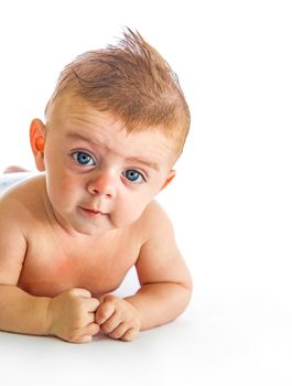 Lovely baby looking at camera on white background