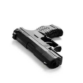 Black pistol over white backgroung