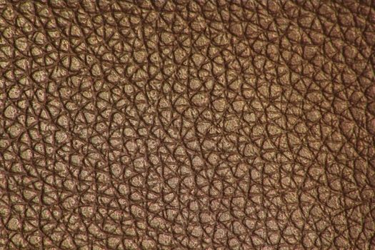 Extreme closeup of Brown leather.