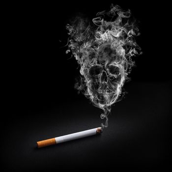 Smoking cigarette with shape of skull on the smoke Smoking Kills. Nicotine addict