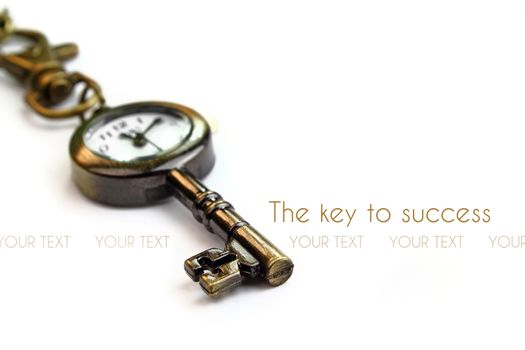 Golden key with a clock on white background