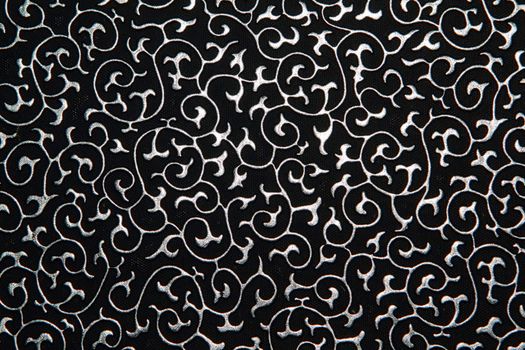 Black leather texture with silver floral