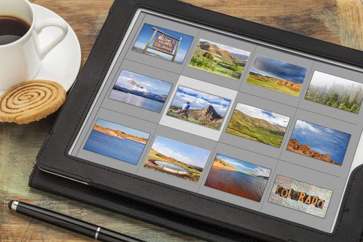 reviewing image library (grid of thumbnails) on a digital tablet computer -colorful Colorado, lakes and mountains, all displayed pictures copyright by the photographer