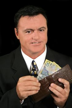 Smug salesman has made more money than he thought he had.