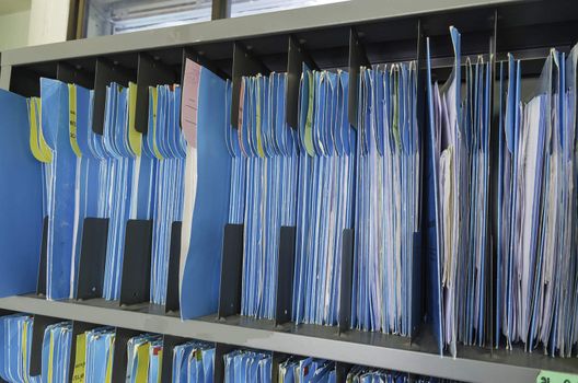 Shelf full of folders and files in an office