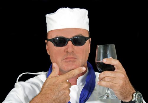 Cool chef offers red wine.