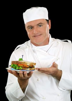 Chef presents healthy salad sandwich ready for serving.