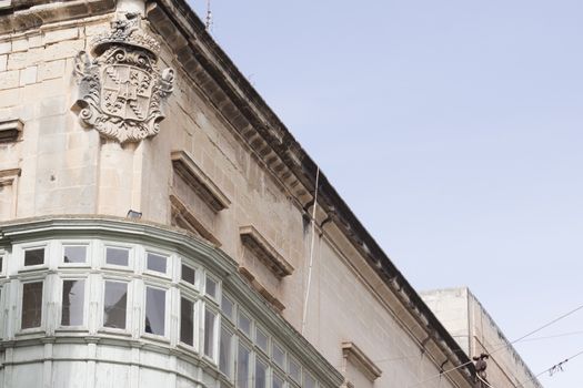 A close up of the Grandmaster's Palace in Valletta, Malta, which houses the Parliament. Space for text