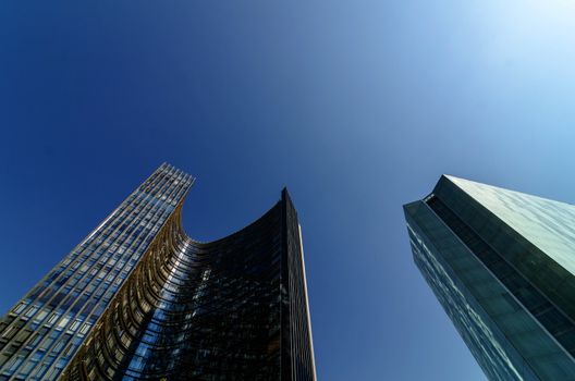 Shiny skyscrapers and a beautiful blue sky