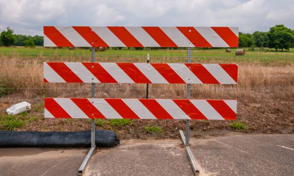 road blocked sign standing at road edge