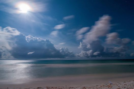 night scene at the beach with super moon natural lighting