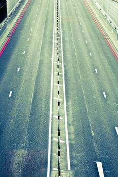 Empty motorway seen from above in vintage tones