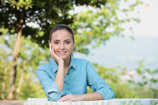 Portrait of smiling young woman outdoors