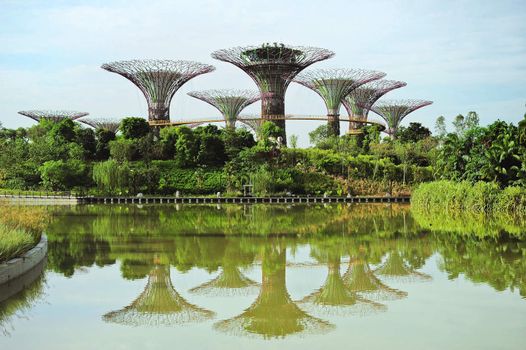 Singapore, Republic of Singapore - May 09, 2013: People walking on the bridge at Gardens by the Bay. Gardens by the Bay was crowned World Building of the Year at the World Architecture Festival 2012